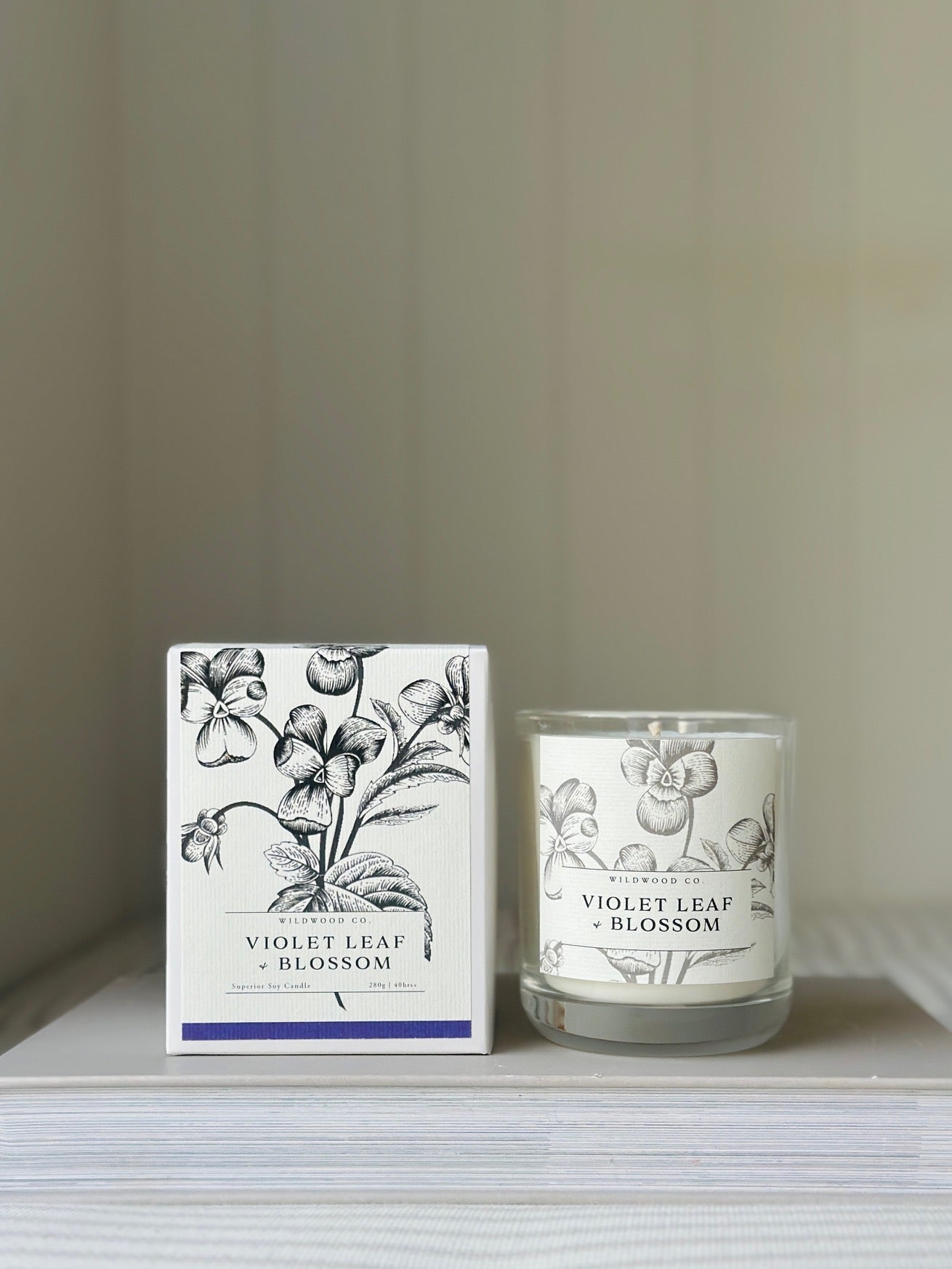 Violet Leaf Blossom Floral Candle Front